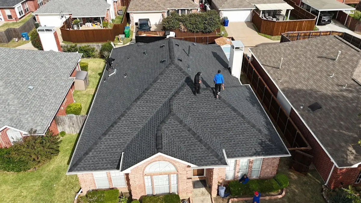 Slate & Tile Roof Repair work in progress on a Machesney Park property